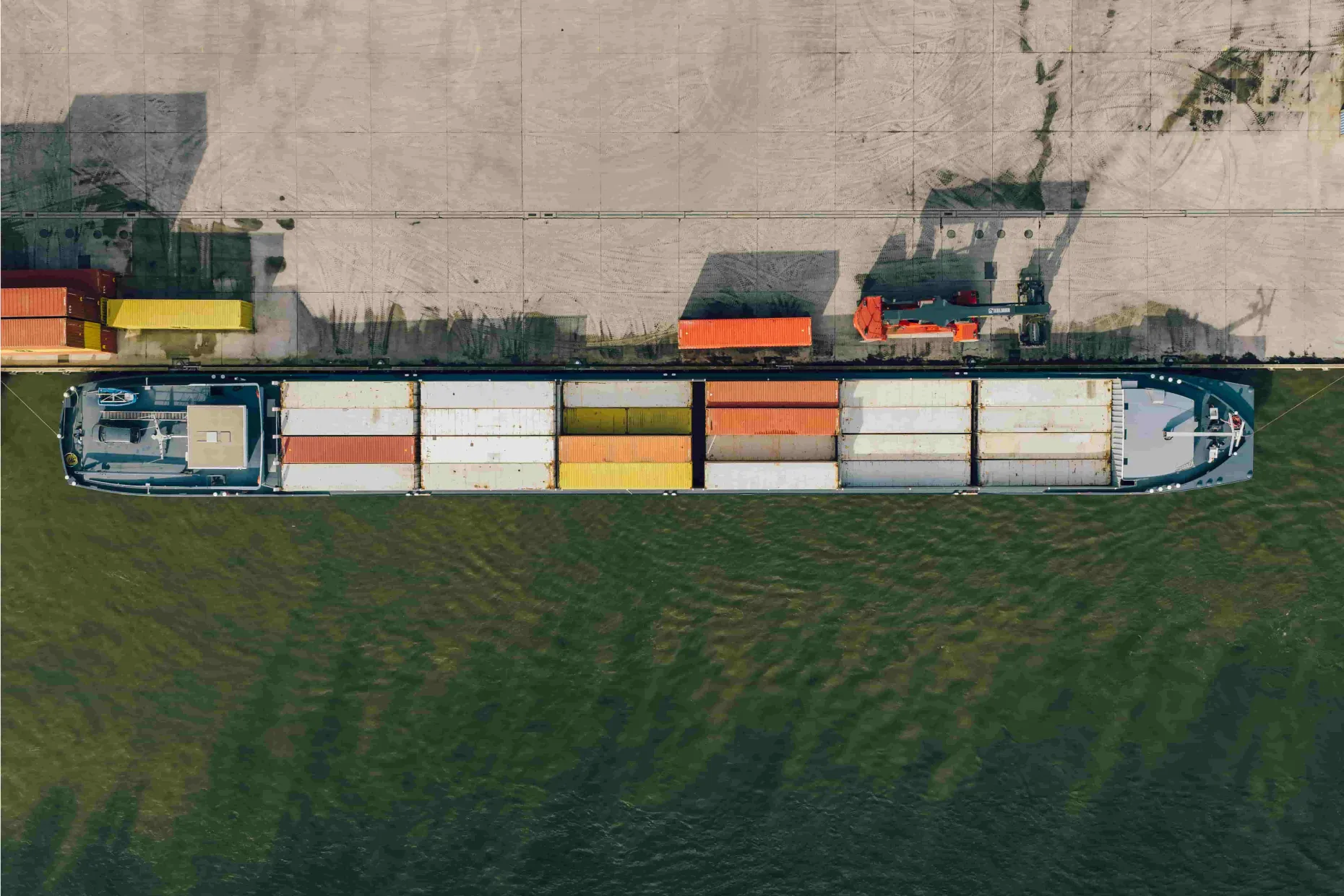 barge_with_containers_being_unloaded_banner
